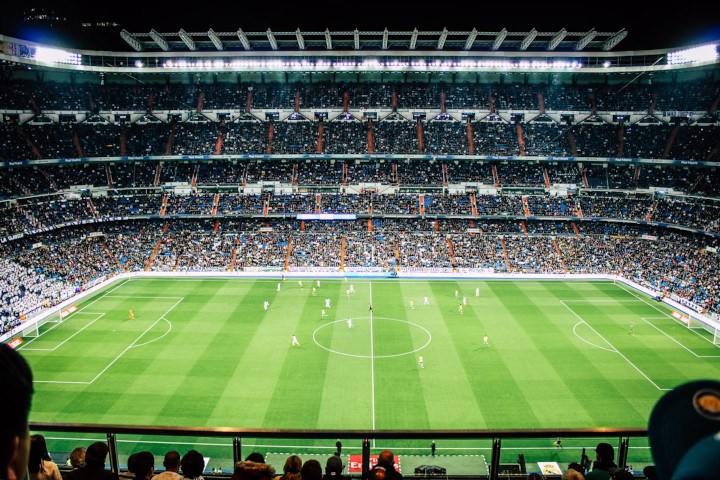 Football Field And Teams Playing